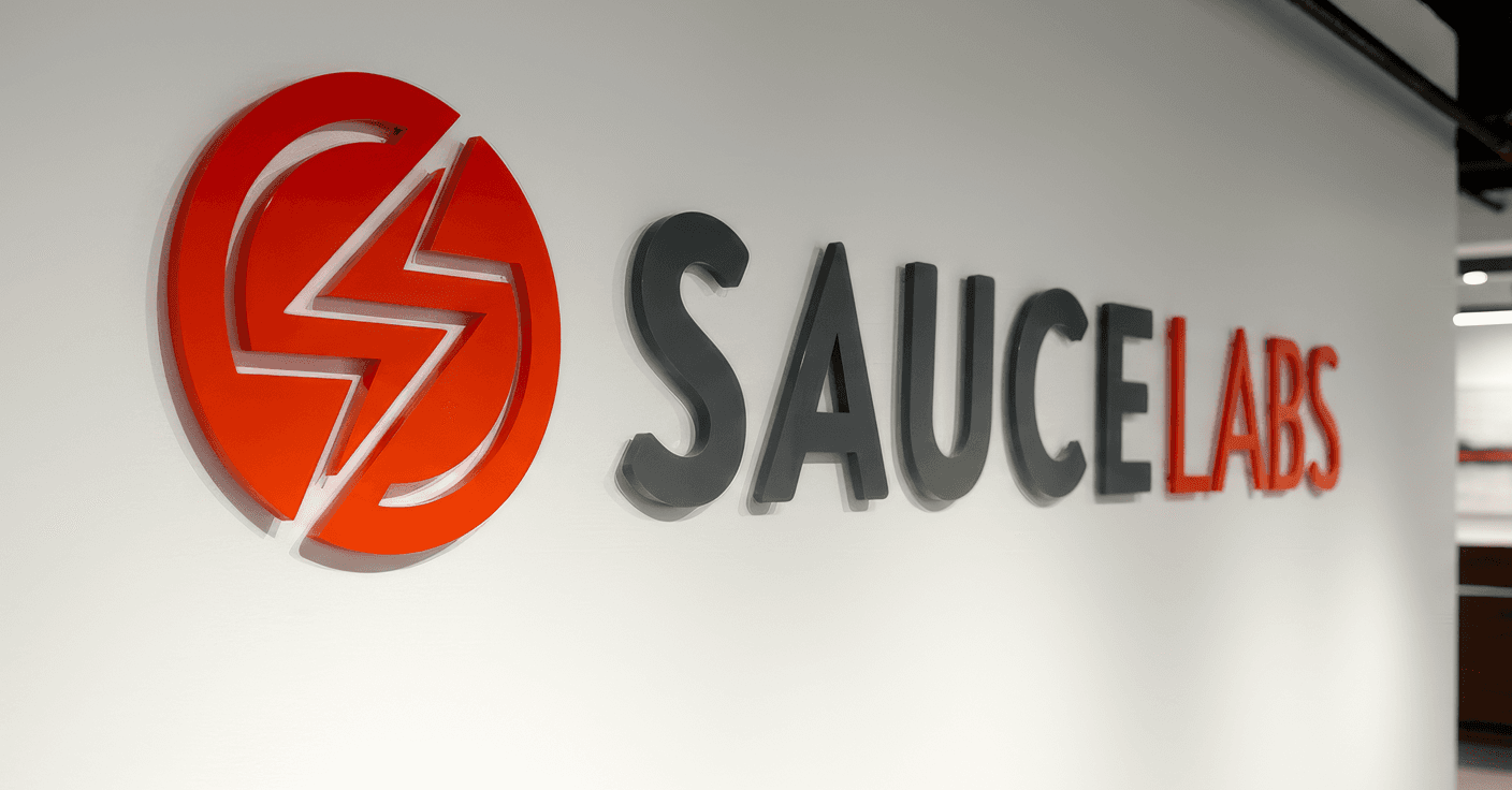 Dimensional lobby sign featuring a circular lightning bolt logo and raised letters