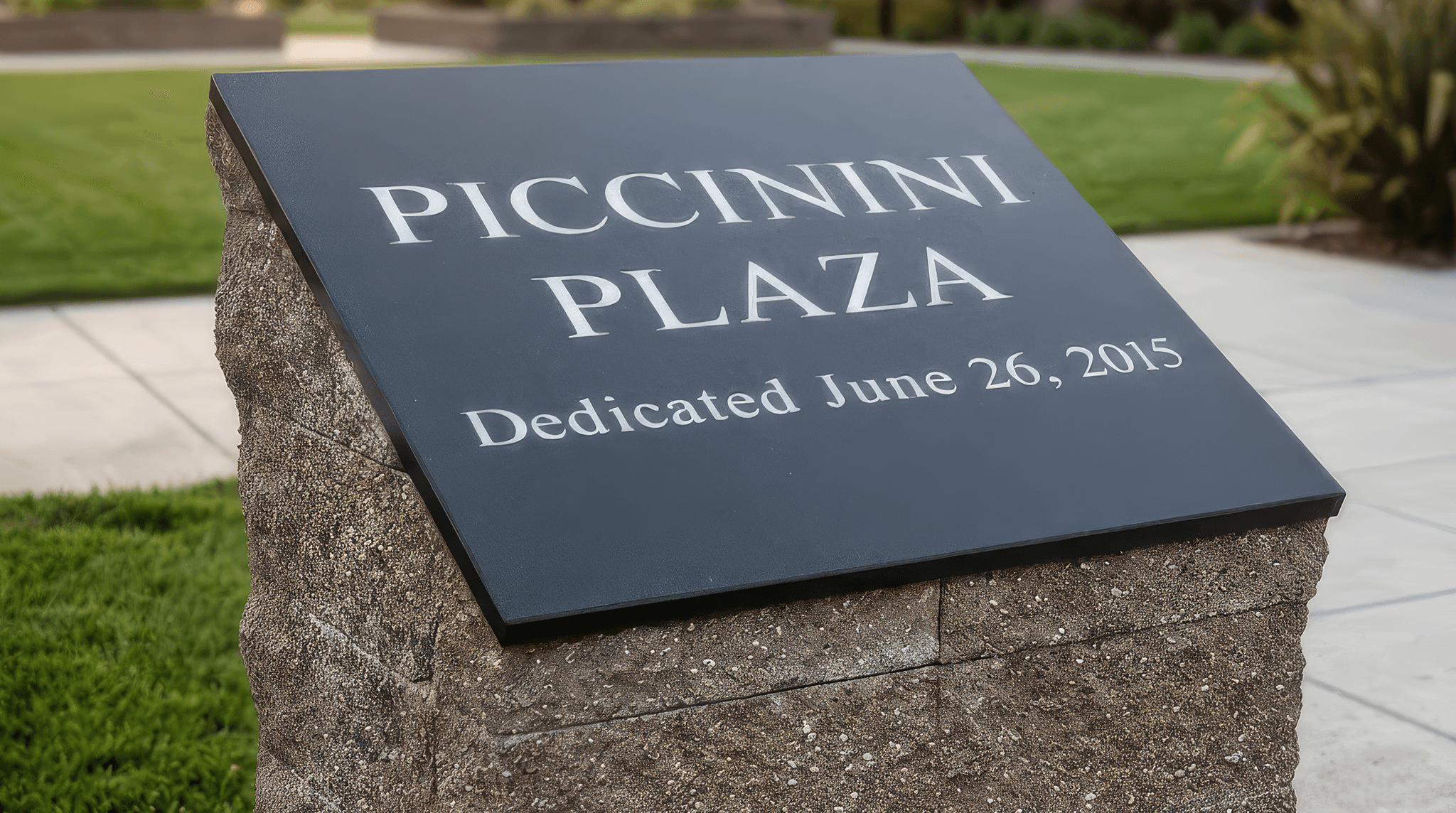 Brushed metal plaque featuring the Sonoma Raceway logo engraved and color-filled