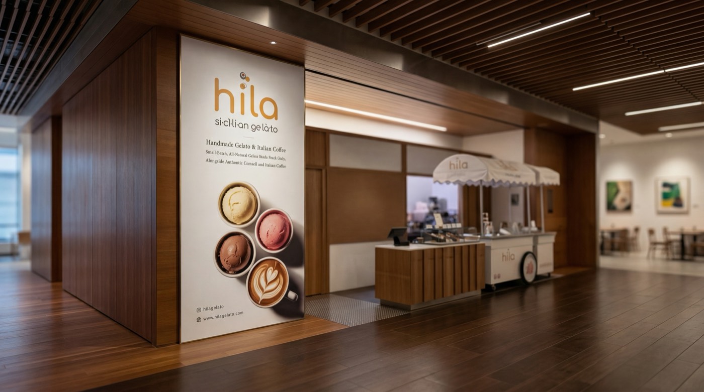 Full-height branded graphic panel in a wood commercial interior