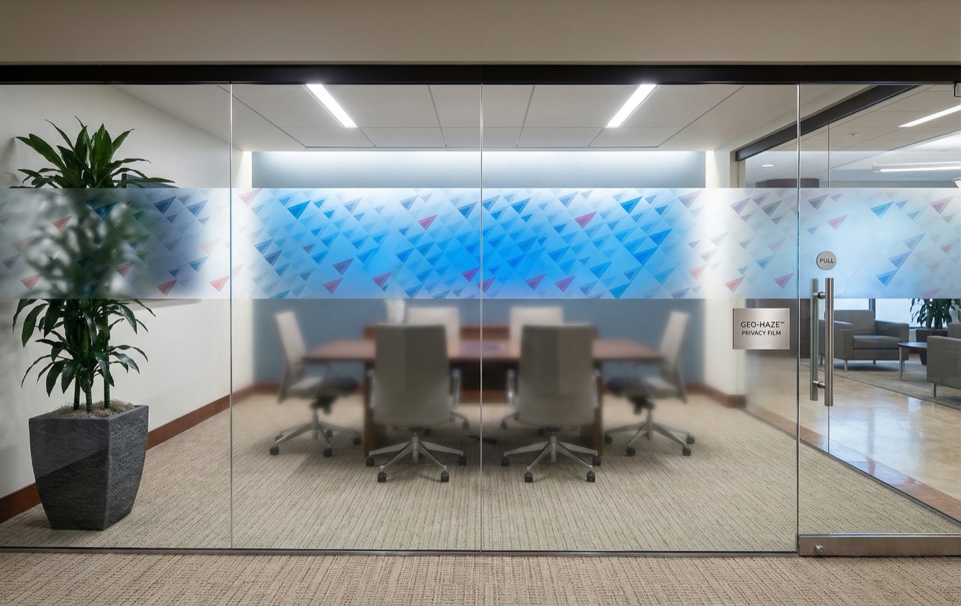 Conference room with geometric blue and red gradient frosted window film