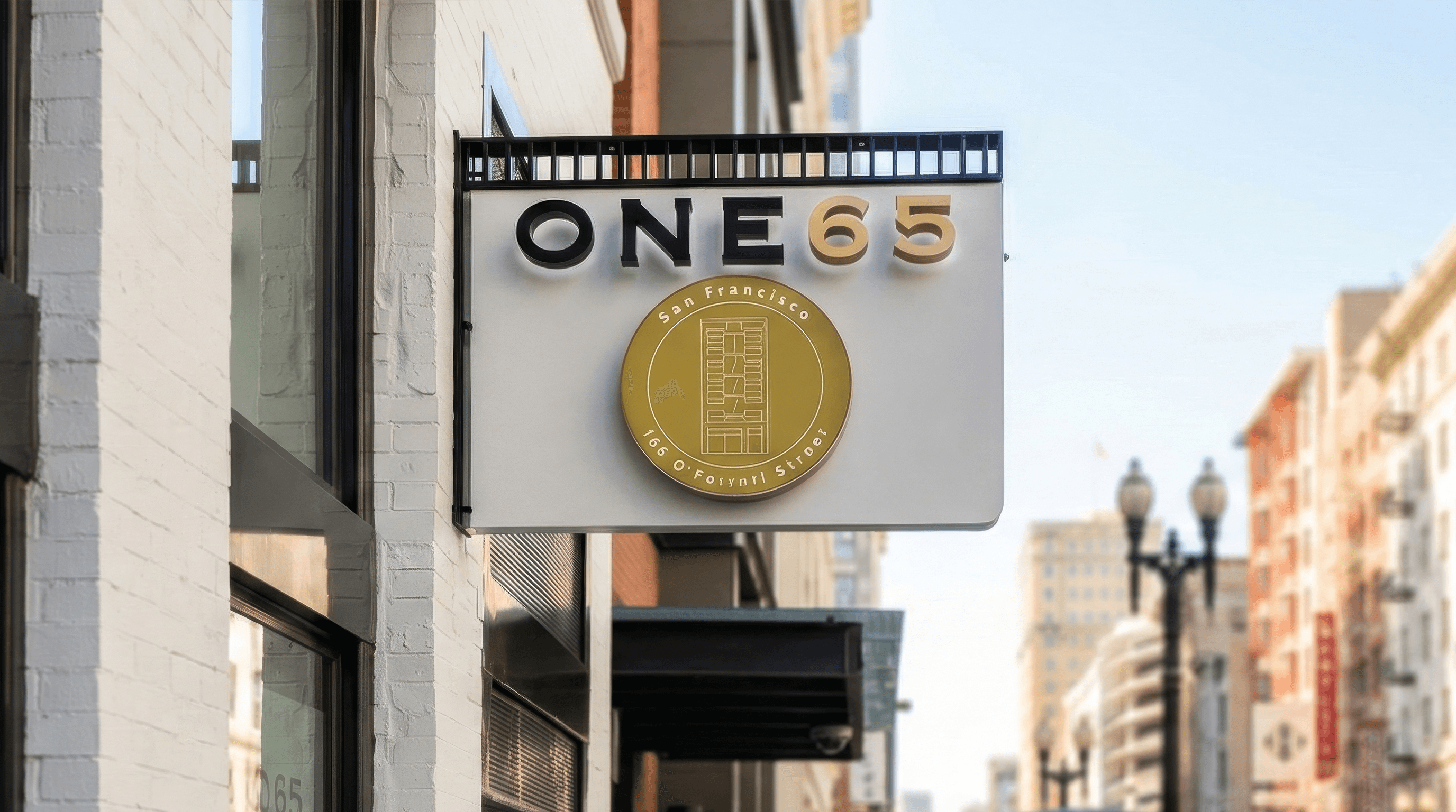 ONE65 luxury restaurant exterior blade sign and storefront branding with polished brass finish