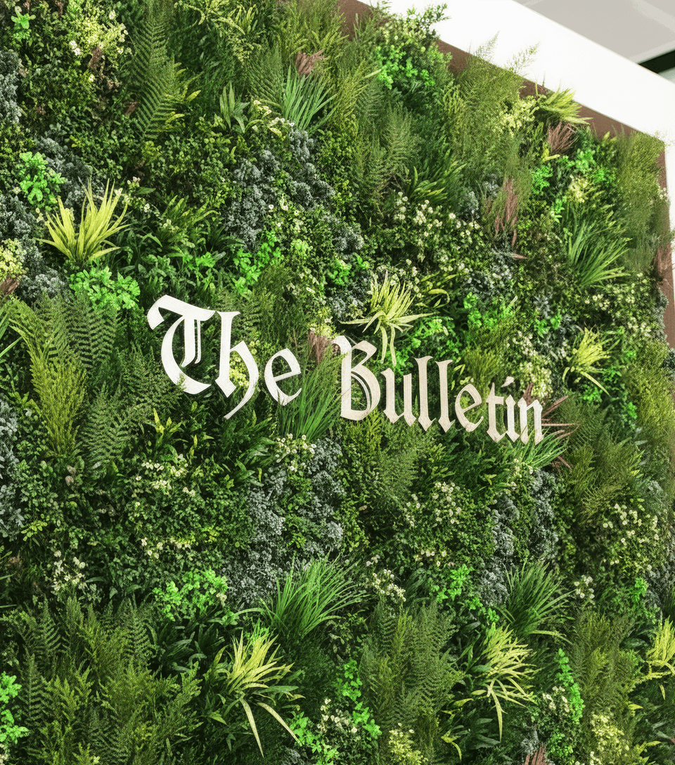 The Bulletin architectural steel letters on modern commercial building exterior